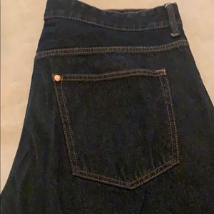 Men’s slim fit button fly jeans. Very dark blue.